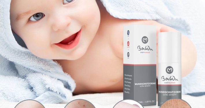 Baby mit Pflegeprodukt und Farbmuster einer Creme in einer Anwendungsszene